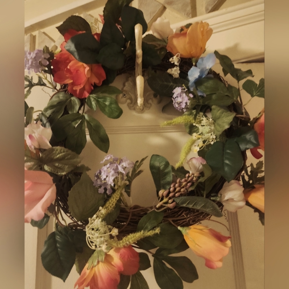 * Wreath made up of pink roses
